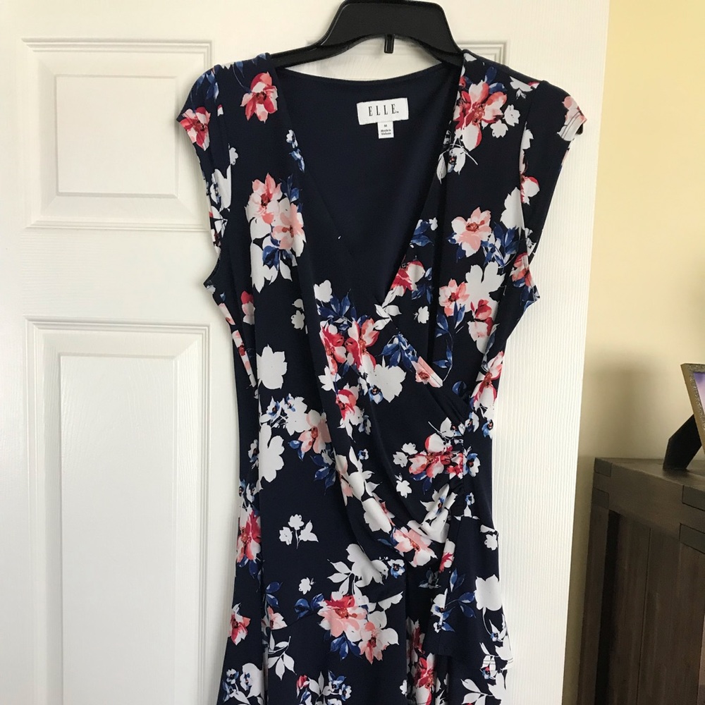 Short sleeved criss cross wrap dress.